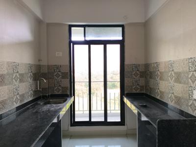 Kitchen Image of 958 Sq.ft 2 BHK Apartment / Flat for sale in Nishi Apurva Ratn, Kalyan West Kalyan for Rs. 7500000