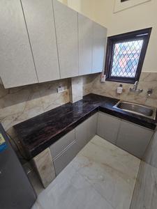 Kitchen Image of 480 Sq.ft 1 BHK Builder Floor for rent in Old Double Storey, Lajpat Nagar New Delhi for Rs. 23000