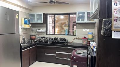 Kitchen Image of 1270 Sq.ft 2 BHK Apartment / Flat for rent in JT JT Stuti Highland, Mughal Sarai Surat for Rs. 25000