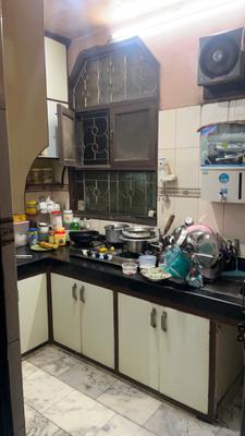 Kitchen Image of 1100 Sq.ft 3 BHK Apartment / Flat for sale in Jamia Nagar New Delhi for Rs. 7000000