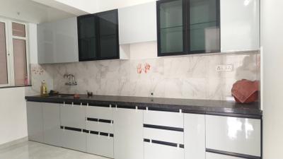 Kitchen Image of 1000 Sq.ft 2 BHK Apartment / Flat for rent in Gulmohar Sky Park, Dhanori Pune for Rs. 22999