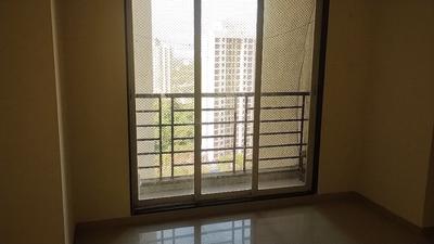 Living Room Image of 690 Sq.ft 1 BHK Apartment / Flat for sale in Gajra Bhoomi Lawns, Shilgaon Thane for Rs. 3800000