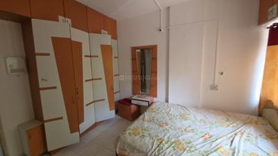Bedroom Image of 950 Sq.ft 2 BHK Apartment / Flat for rent in Nirman Nadbramha Society, Warje Pune for Rs. 26000