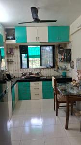 Kitchen Image of 880 Sq.ft 2 BHK Apartment / Flat for sale in Kothrud Pune for Rs. 10500000