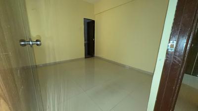 Bedroom Image of 1050 Sq.ft 2 BHK Apartment / Flat for rent in Pramukh Paradise, Taloja Navi Mumbai for Rs. 15000