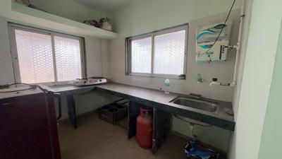 Kitchen Image of 1000 Sq.ft 2 BHK Builder Floor for rent in Gokhalenagar Pune for Rs. 35000
