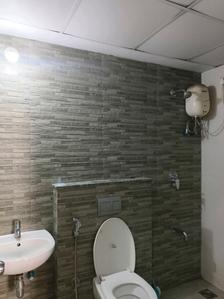 Common Bathroom Image of 750 Sq.ft 1.5 BHK Apartment / Flat for rent in Lodha Palava Downtown, Palava Phase 2 Thane for Rs. 12500