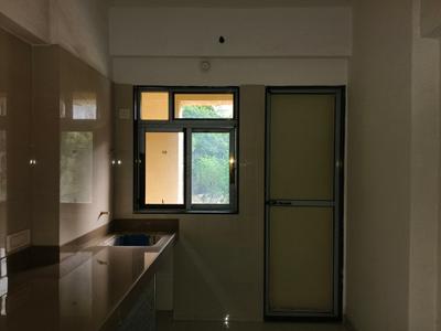 Kitchen Image of 616 Sq.ft 1 BHK Apartment / Flat for sale in Cosmos Meluha, Khidkali Thane for Rs. 4700000