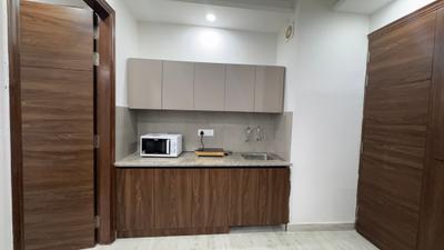 Kitchen Image of 1050 Sq.ft 1 BHK Builder Floor for rent in DLF Phase 3 Gurgaon for Rs. 37500