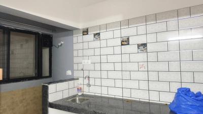 Kitchen Image of 450 Sq.ft 1 BHK Apartment / Flat for rent in APAK Ajinkya Towers, Charholi Budruk Pune for Rs. 17000