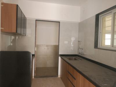 Kitchen Image of 1023 Sq.ft 2 BHK Apartment / Flat for sale in Mahindra Nestalgia, Pimpri Pune for Rs. 10500000