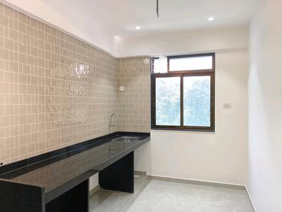 Kitchen Image of 668 Sq.ft 1 BHK Apartment / Flat for sale in Kulswamini Sukrya Heights, Dombivli West Thane for Rs. 4800000