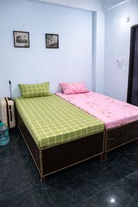 Bedroom Image of Unique PG in Sector 63, Noida