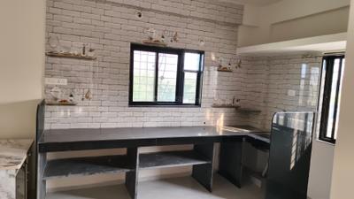 Kitchen Image of 950 Sq.ft 2 BHK Apartment / Flat for rent in Tathawade Pune for Rs. 14000
