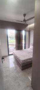 Bedroom Image of 765 Sq.ft 1 BHK Apartment / Flat for sale in Rudis Shivalaya Heights, Khidkali Thane for Rs. 3900000