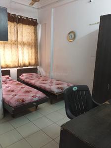 Bedroom Image of Tulja PG Room in Thaltej, Ahmedabad