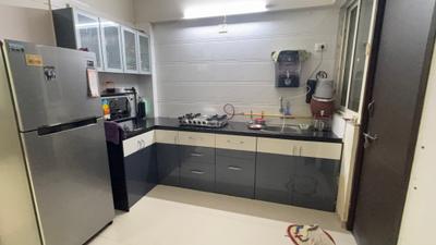 Kitchen Image of 937 Sq.ft 3 BHK Apartment / Flat for sale in PSY Pramukh Pacific, Sargasan Gandhinagar for Rs. 12500000