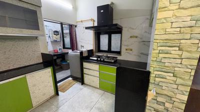Kitchen Image of 1750 Sq.ft 3 BHK Apartment / Flat for sale in Bakeri Surel Apartments, Bodakdev Ahmedabad for Rs. 14500000