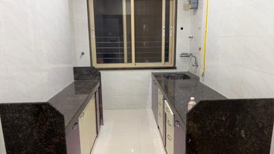 Kitchen Image of 800 Sq.ft 2 BHK Apartment / Flat for rent in Jeevandeep Shri Yamai Krupa, Mahim Mumbai for Rs. 110000