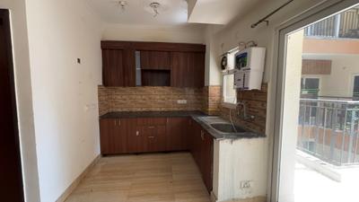 Kitchen Image of 990 Sq.ft 2.5 BHK Apartment / Flat for sale in NBCC Tropical Garden, Noida Extension Greater Noida for Rs. 7500000