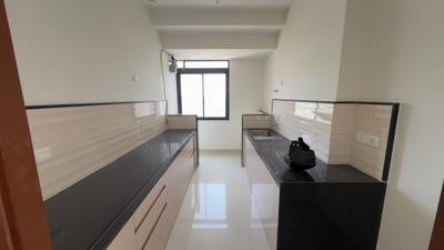 Kitchen Image of 850 Sq.ft 2 BHK Apartment / Flat for rent in Dynamix Divum, Malad East Mumbai for Rs. 75000