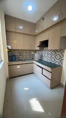 Kitchen Image of 980 Sq.ft 2 BHK Apartment / Flat for rent in Jaypee Kosmos, Sector 134 Noida for Rs. 25000