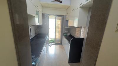 Kitchen Image of 900 Sq.ft 2 BHK Apartment / Flat for rent in Madhav Palacia, Hiranandani Estate Thane for Rs. 36000
