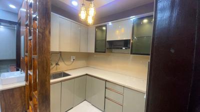 Kitchen Image of 1000 Sq.ft 3 BHK Builder Floor for rent in Dwarka Mor New Delhi for Rs. 28000