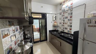 Kitchen Image of 979 Sq.ft 2 BHK Apartment / Flat for sale in Haware Estate, Kasarvadavali Thane for Rs. 9500000