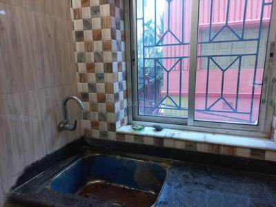 Kitchen Image of 960 Sq.ft 3 BHK Apartment / Flat for sale in Kutighat Kolkata for Rs. 5700000