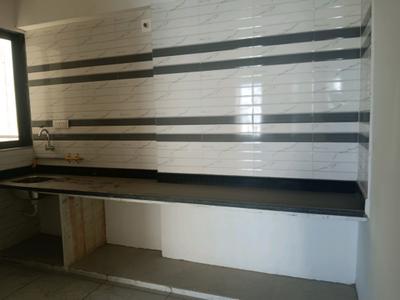 Kitchen Image of 639 Sq.ft 1 BHK Apartment / Flat for sale in Greenscape Bhagwat Greens, Narolgam Ahmedabad for Rs. 1911000
