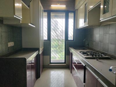 Kitchen Image of 1045 Sq.ft 2 BHK Apartment / Flat for sale in Tharwani Riviera, Kharghar Navi Mumbai for Rs. 12500000
