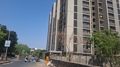 Building Image of 2000 Sq.ft 3 BHK Apartment / Flat for rent in Shiv Shivalay Sharnam, Kudasan Gandhinagar for Rs. 29000