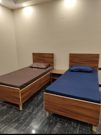 Bedroom Image of SOMO PG  in Sector 18, Noida