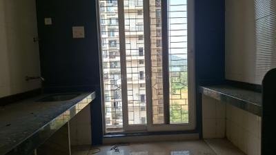 Kitchen Image of 950 Sq.ft 2 BHK Apartment / Flat for sale in Arihant Abhilasha, Kharghar Navi Mumbai for Rs. 12500000