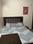 Bedroom Image of EVERGREEN HOME PG in Ramesh Nagar, New Delhi