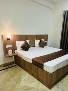 Bedroom Image of Living PG in Lajpat Nagar, New Delhi