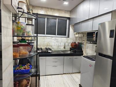 Kitchen Image of 950 Sq.ft 2.5 BHK Apartment / Flat for sale in Nityanand Baug CHS, Chembur Mumbai for Rs. 27500000