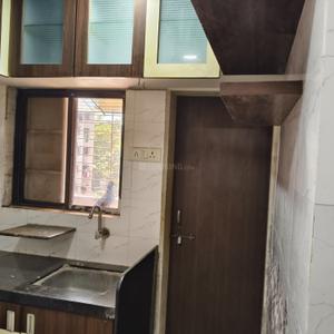 Kitchen Image of 600 Sq.ft 1 BHK Apartment / Flat for rent in Vesu Surat for Rs. 15000