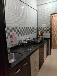 Kitchen Image of 686 Sq.ft 1 BHK Apartment / Flat for sale in Thakurli Thane for Rs. 5200000