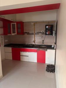 Kitchen Image of 900 Sq.ft 2 BHK Apartment / Flat for rent in Shree Infra Shagun 108, Zundal Ahmedabad for Rs. 25000
