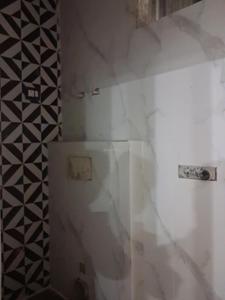 Common Bathroom Image of 1000 Sq.ft 2 BHK Apartment / Flat for sale in Capital Hometech Pride 2 by Capital Infra, Sector 73 Noida for Rs. 4300000