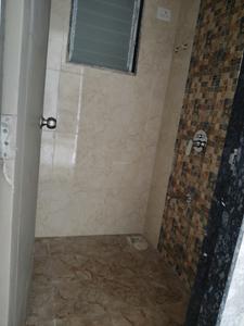 Common Bathroom Image of 668 Sq.ft 1 BHK Apartment / Flat for sale in Nitya Horizon, Pushpak Nagar Navi Mumbai for Rs. 4590000