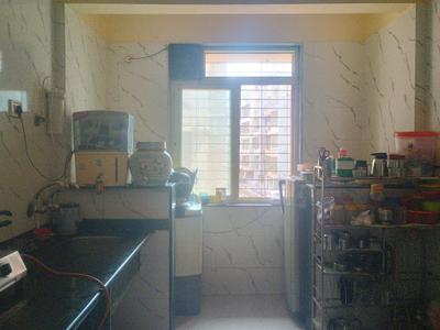 Kitchen Image of 695 Sq.ft 1 BHK Apartment / Flat for sale in Mohan Palms, Badlapur East Badlapur for Rs. 3000000