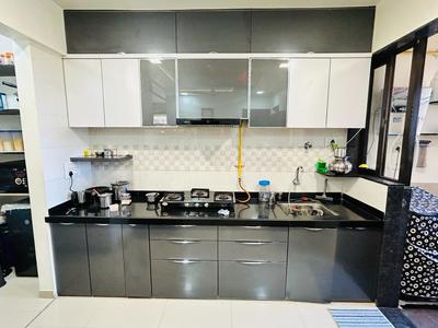 Kitchen Image of 950 Sq.ft 1.5 BHK Apartment / Flat for rent in Pramukh Vivan, Chala Vapi for Rs. 14000