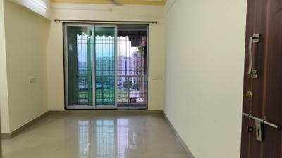 Living Room Image of 715 Sq.ft 1 BHK Apartment / Flat for rent in Gajra Bhoomi Gardenia 1, Kalamboli Navi Mumbai for Rs. 18000
