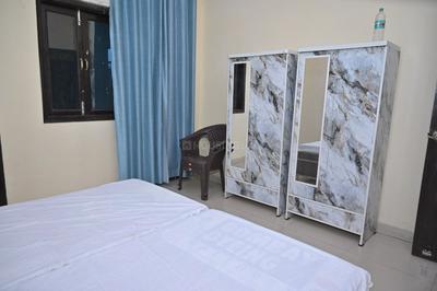 Bedroom Image of Mid starrf PG in Sector 63 A, Noida
