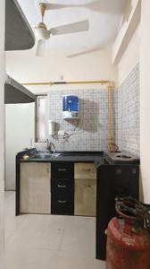 Kitchen Image of 788 Sq.ft 1 BHK Apartment / Flat for rent in Poddar Palm Greens, Makarba Ahmedabad for Rs. 22000