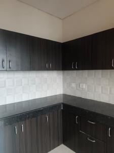 Kitchen Image of 900 Sq.ft 2 BHK Apartment / Flat for sale in Aditya City Apartment Ghaziabad, Wave City Ghaziabad for Rs. 6300000