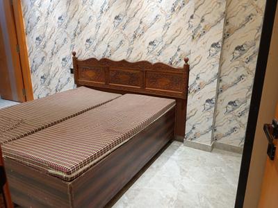 Bedroom Image of 1000 Sq.ft 2 BHK Builder Floor for rent in Swaraj Homes RWA Sant Nagar, Sant Nagar New Delhi for Rs. 40000